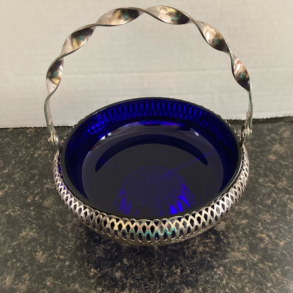 Vintage cobalt blue glass candy dish in silver basket